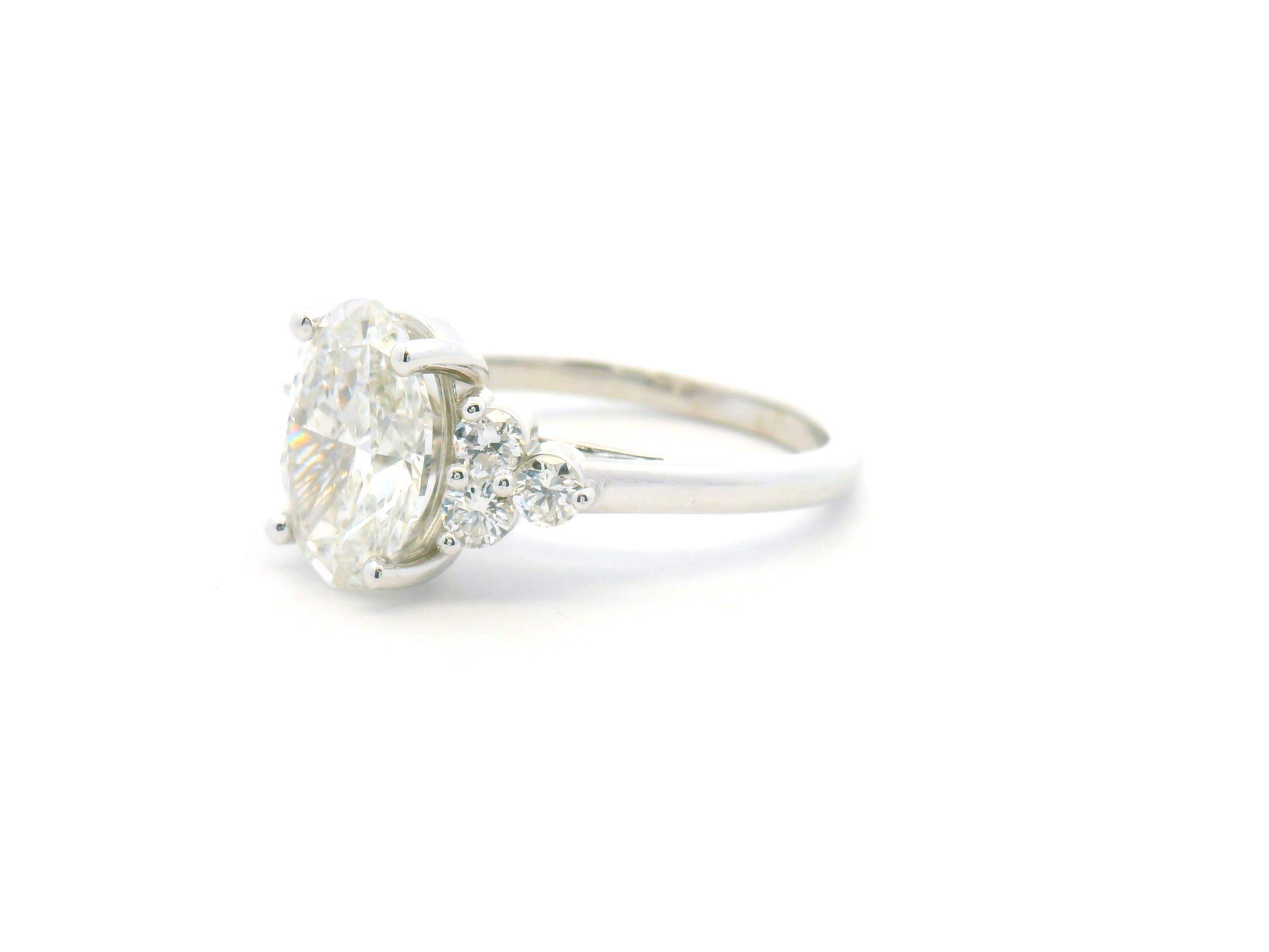 Oval Cluster Accent Engagement Ring