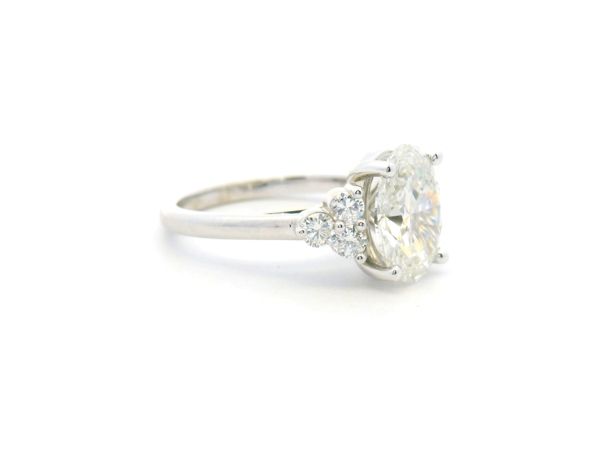 Oval Cluster Accent Engagement Ring