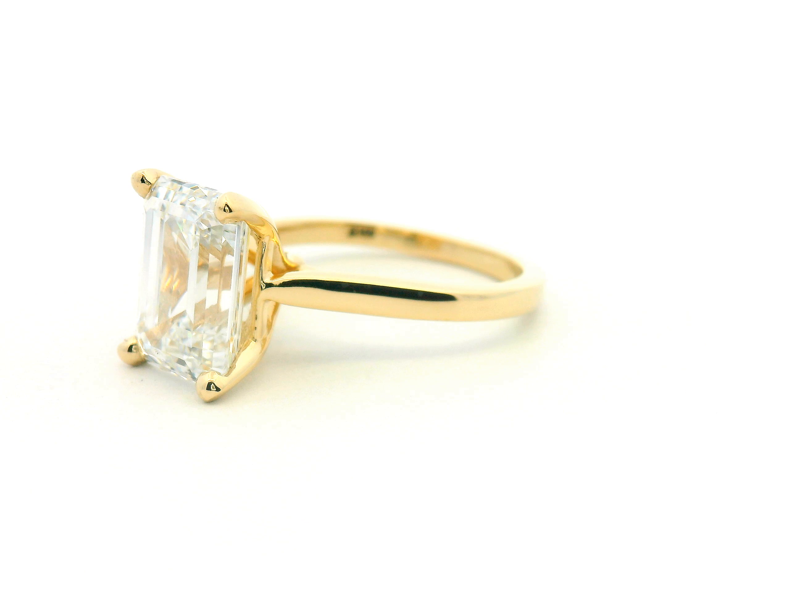 Emerald Cut Cathedral Solitaire Engagement Ring