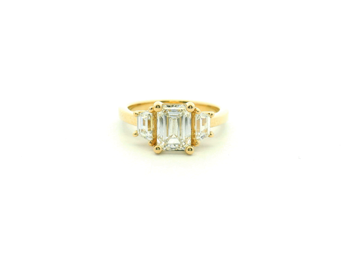 Emerald Cut Three-Stone Engagement Ring