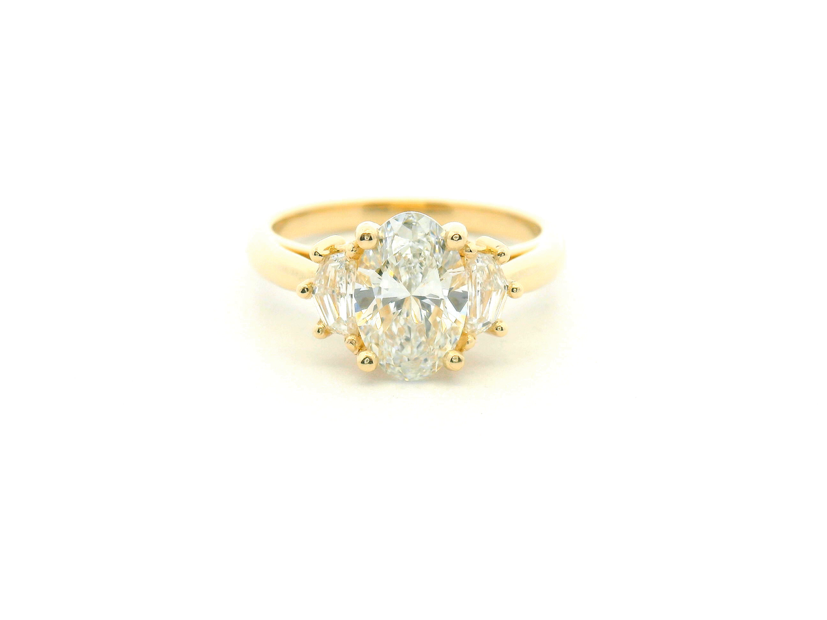 Oval Three-Stone Engagement Ring with Cadillac Side Diamonds