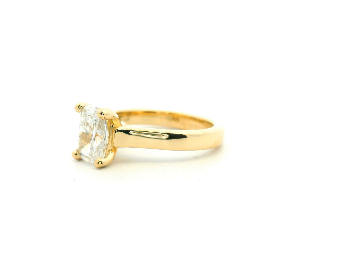 Elongated Cushion Engagement Ring with Bold Cathedral