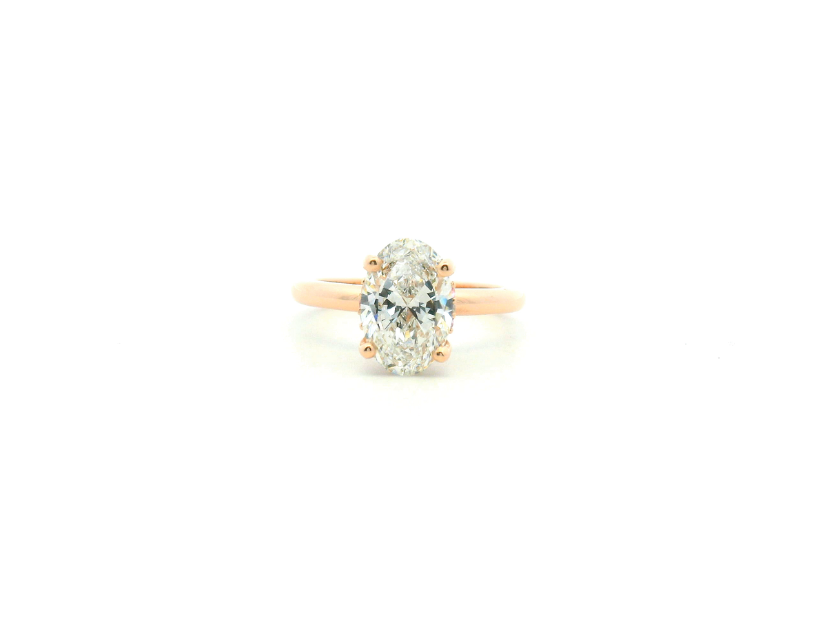 Solitaire Engagement Ring with Pink Sapphire & Diamond Hidden Halo