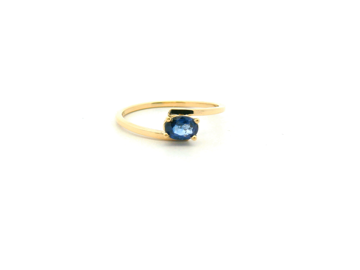 Yellow Oval Blue Sapphire Four-Prong Solitaire Ring