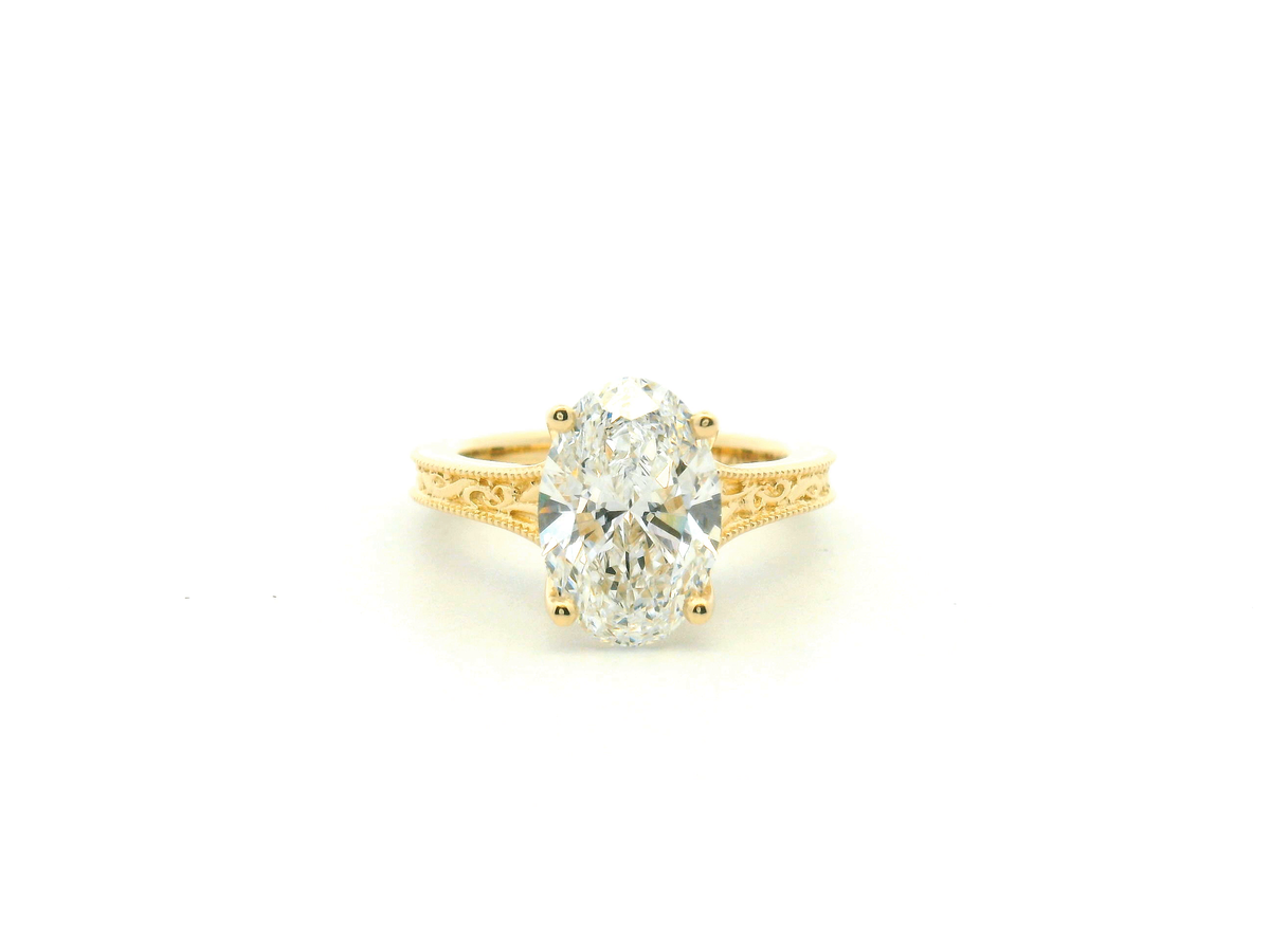 Oval Engagement Ring with Trellis Gallery and Engraved Band