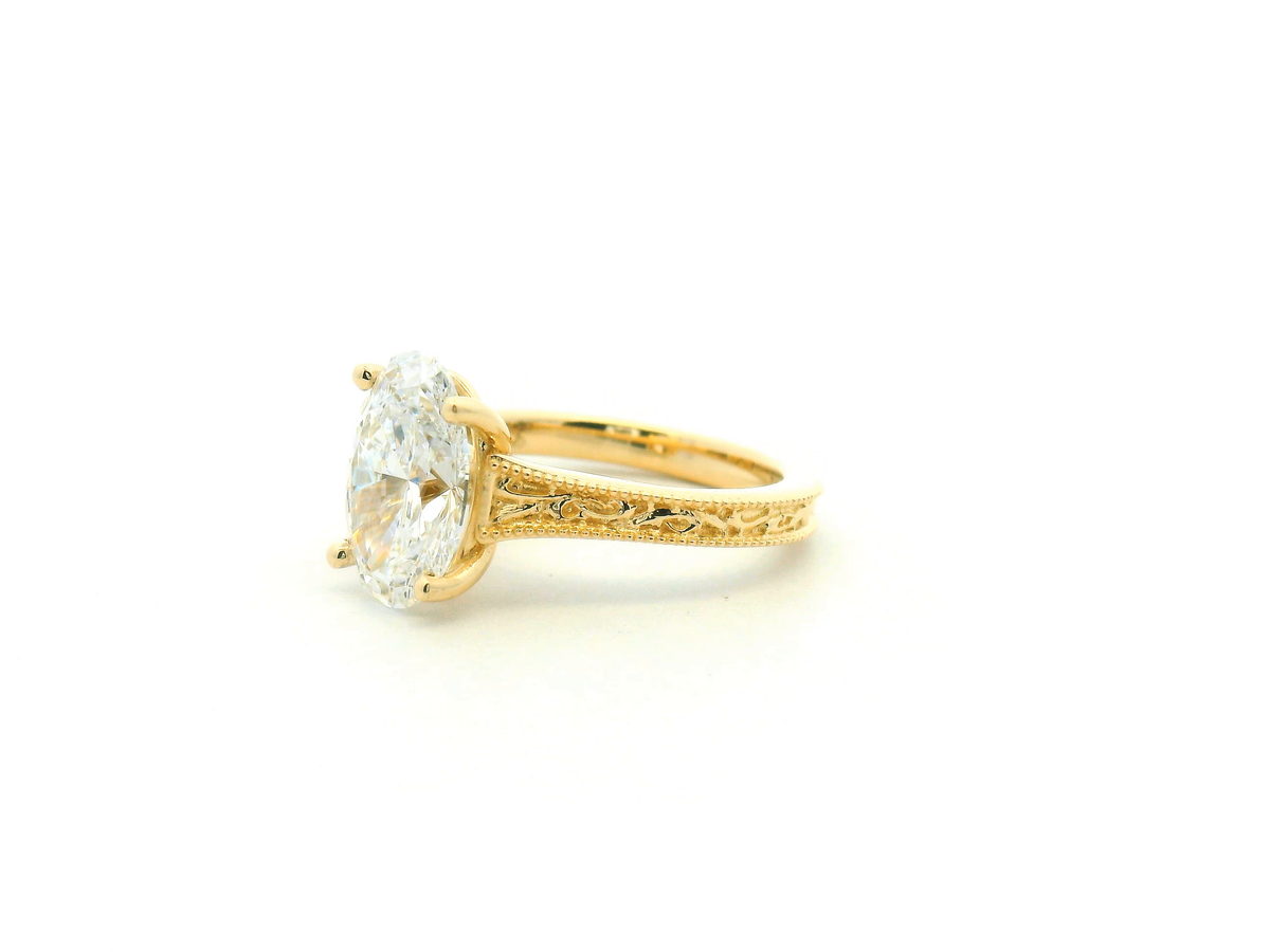 Oval Engagement Ring with Trellis Gallery and Engraved Band