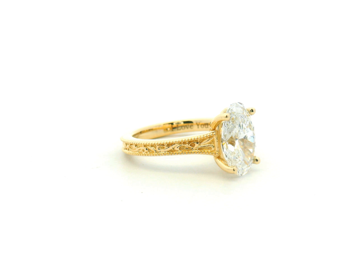 Oval Engagement Ring with Trellis Gallery and Engraved Band