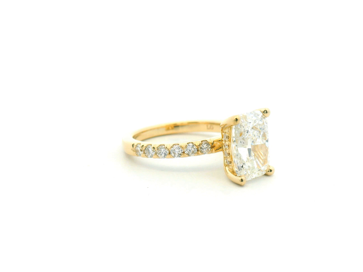 Elongated Cushion Hidden Halo & Accented Engagement Ring