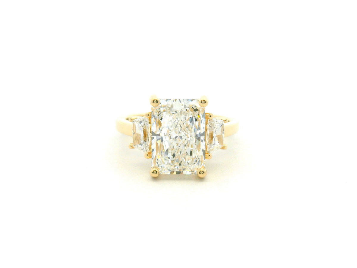 Three Stone Radiant Engagement Ring with Trapezoid Side Stones